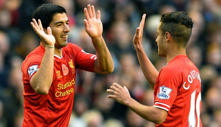 Coutinho y Suárez durante un partido con el Liverpool