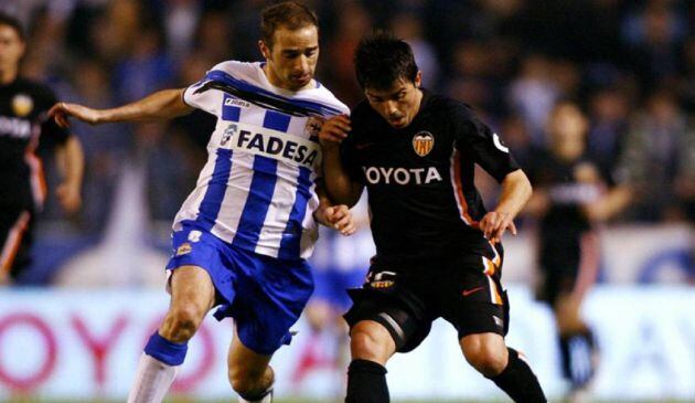 Pablo Álvarez y David Villa durante un partido entre Dépor y Valencia