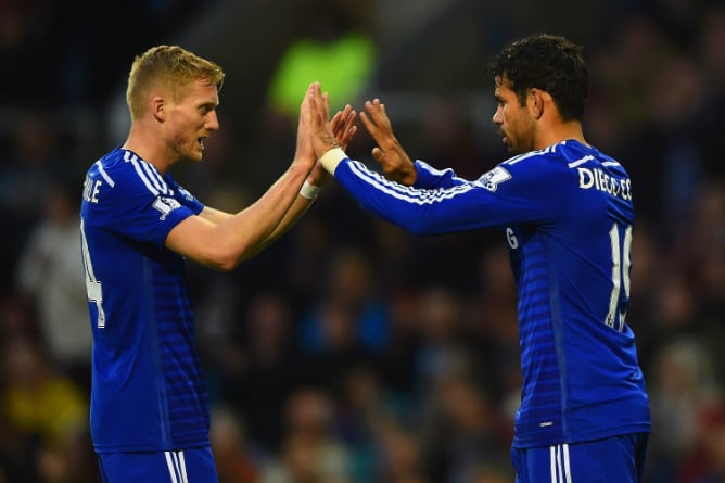 Diego Costa y Schürrle celebran un gol