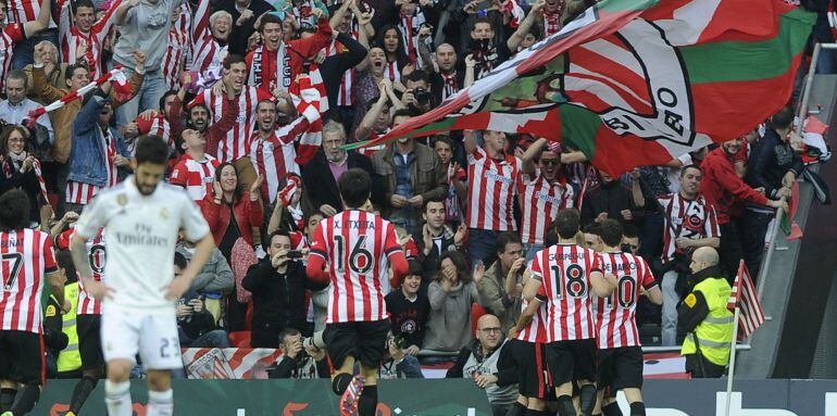 Athletic Bilbao players celebrate after scoring the opener during the Spanish league football match Athletic Club Bilbao vs Real Madrid CF at the San Mames stadium in Bilbao on March 7, 2015. Athletic won 1-0.xA0xA0 AFP PHOTO/ ANDER GILLENEA
