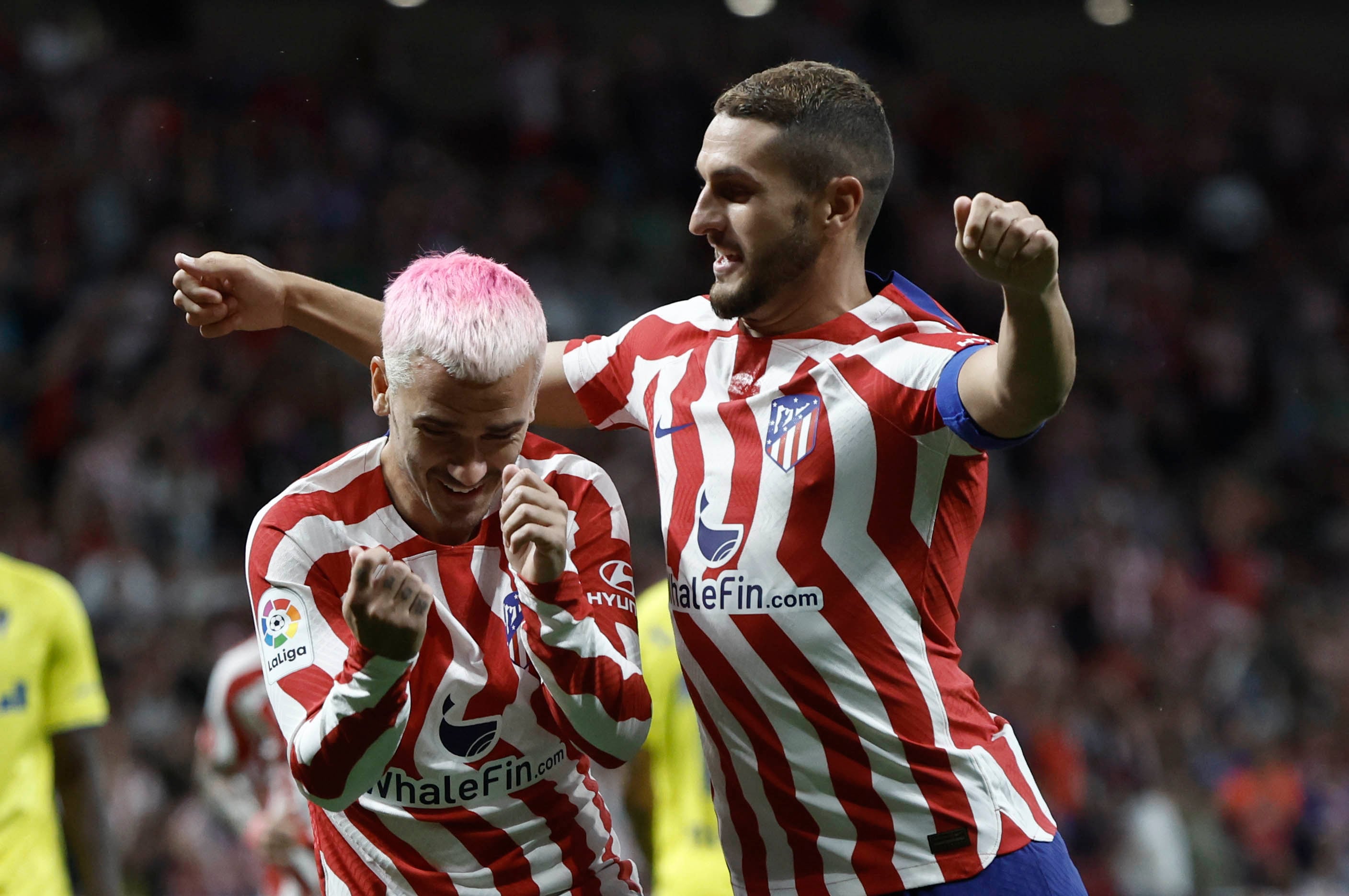 Antoine Griezmann celebra con su compañero Koke Resurrección el primer gol del Atlético