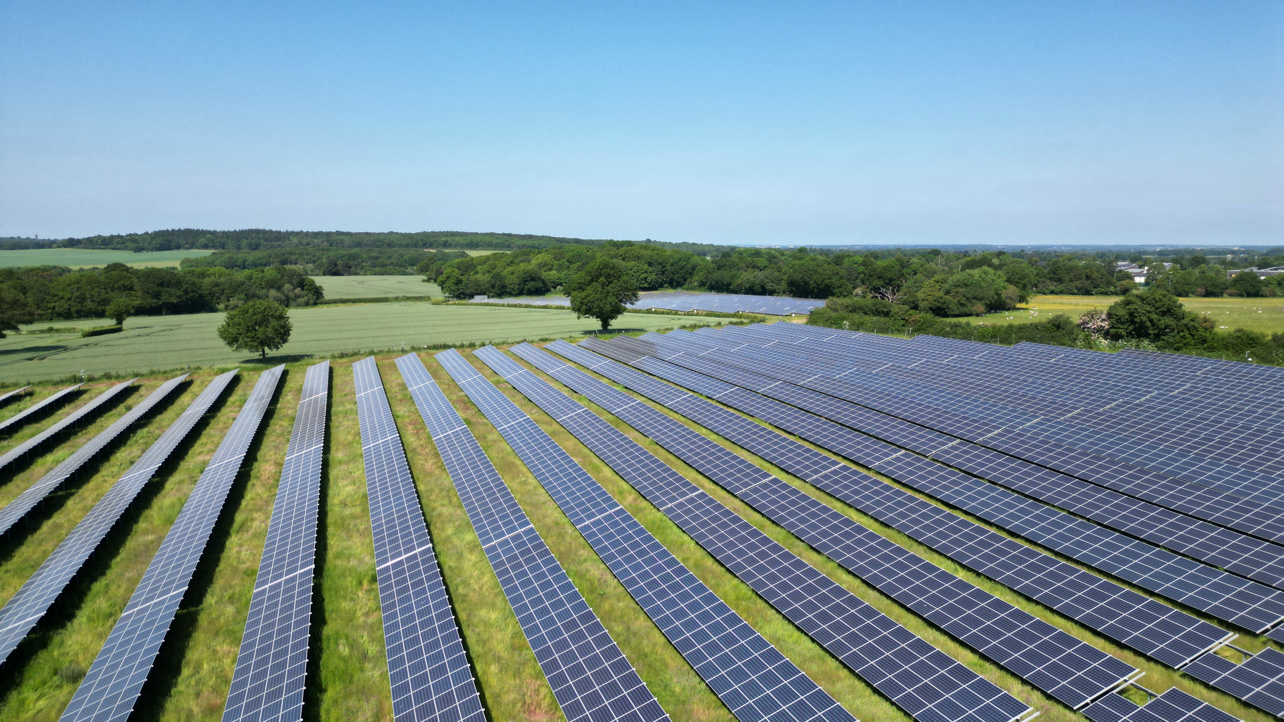 Aerial view of solar panels at a solar farm in Hertfordshire, UK