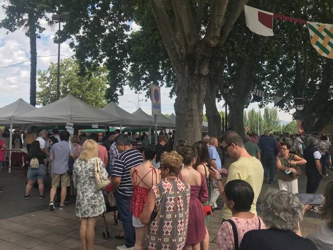 Reparto del pez, el pan y el vino