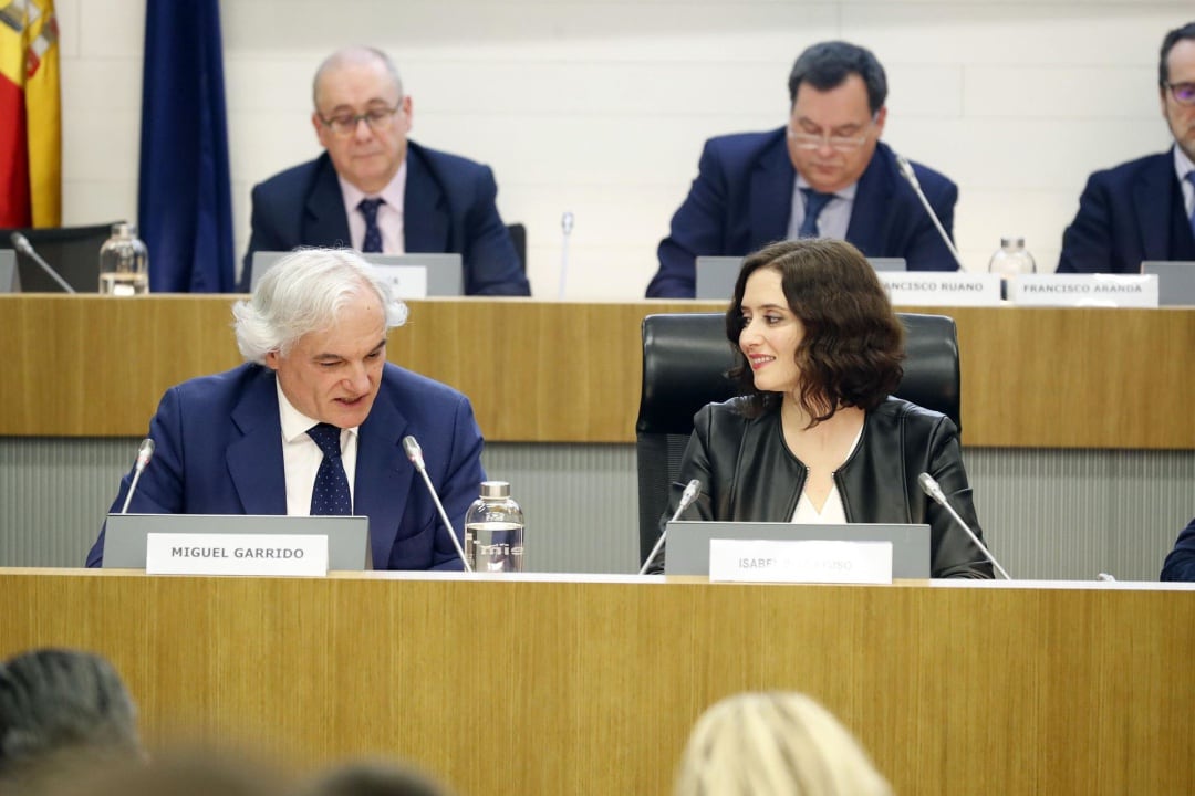 Miguel Garrido (CEIM), junto a la presidenta Isabel Díaz Ayuso, en una imagen de archivo