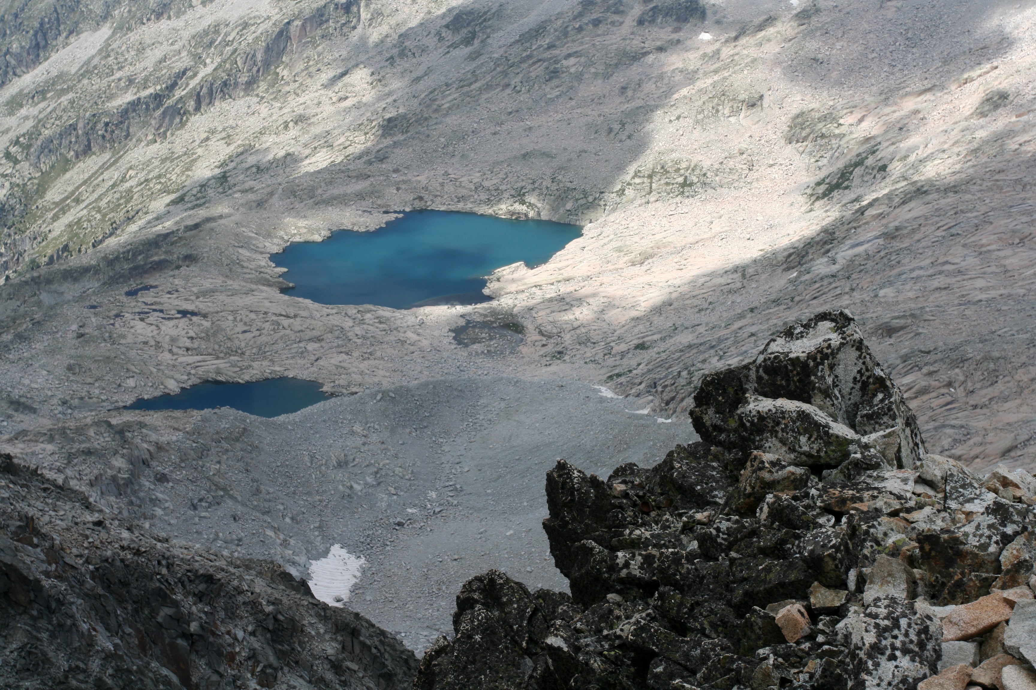 Mountain lake at Mount Pico de Aneto in Huesca, Spain. Pico de Aneto is the highest mountain in Pyrenees at 3404 meters.