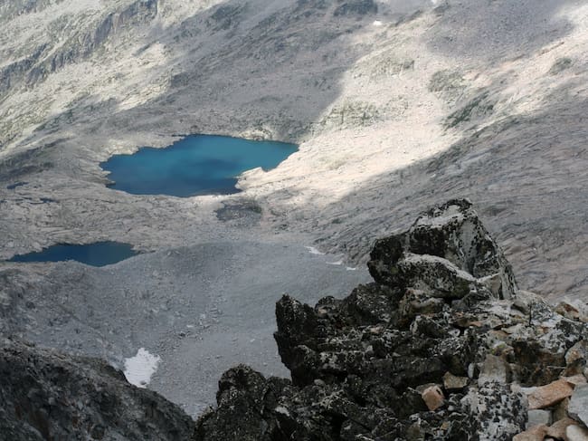 Mountain lake at Mount Pico de Aneto in Huesca, Spain. Pico de Aneto is the highest mountain in Pyrenees at 3404 meters.