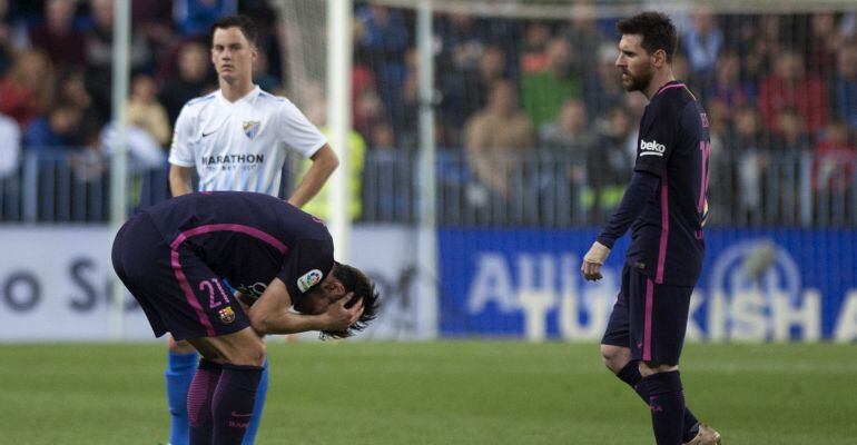 Leo Messi y André Gomes, desesperados en La Rosaleda