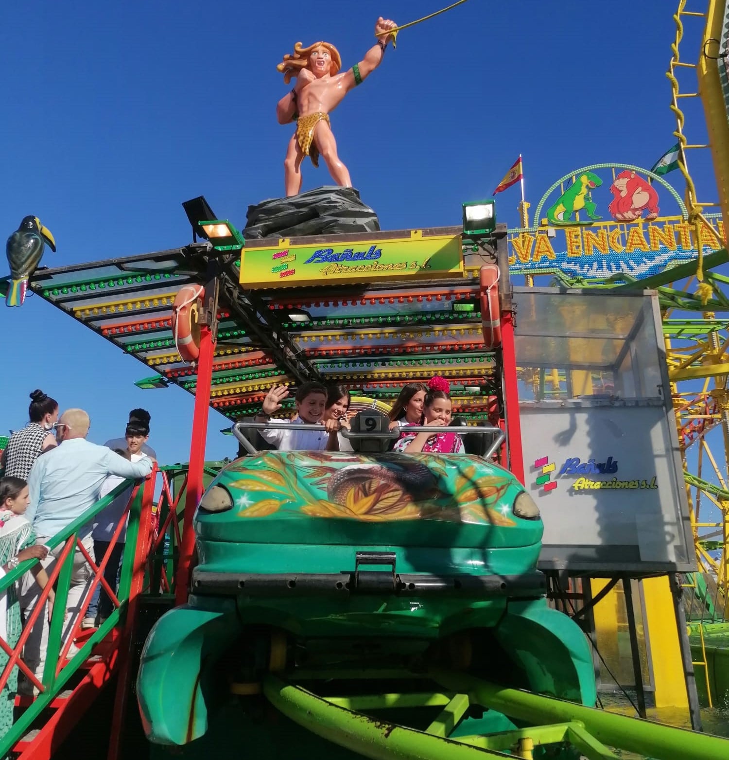Dos niños disfrutando de las atracciones de la Feria del Caballo de Jerez