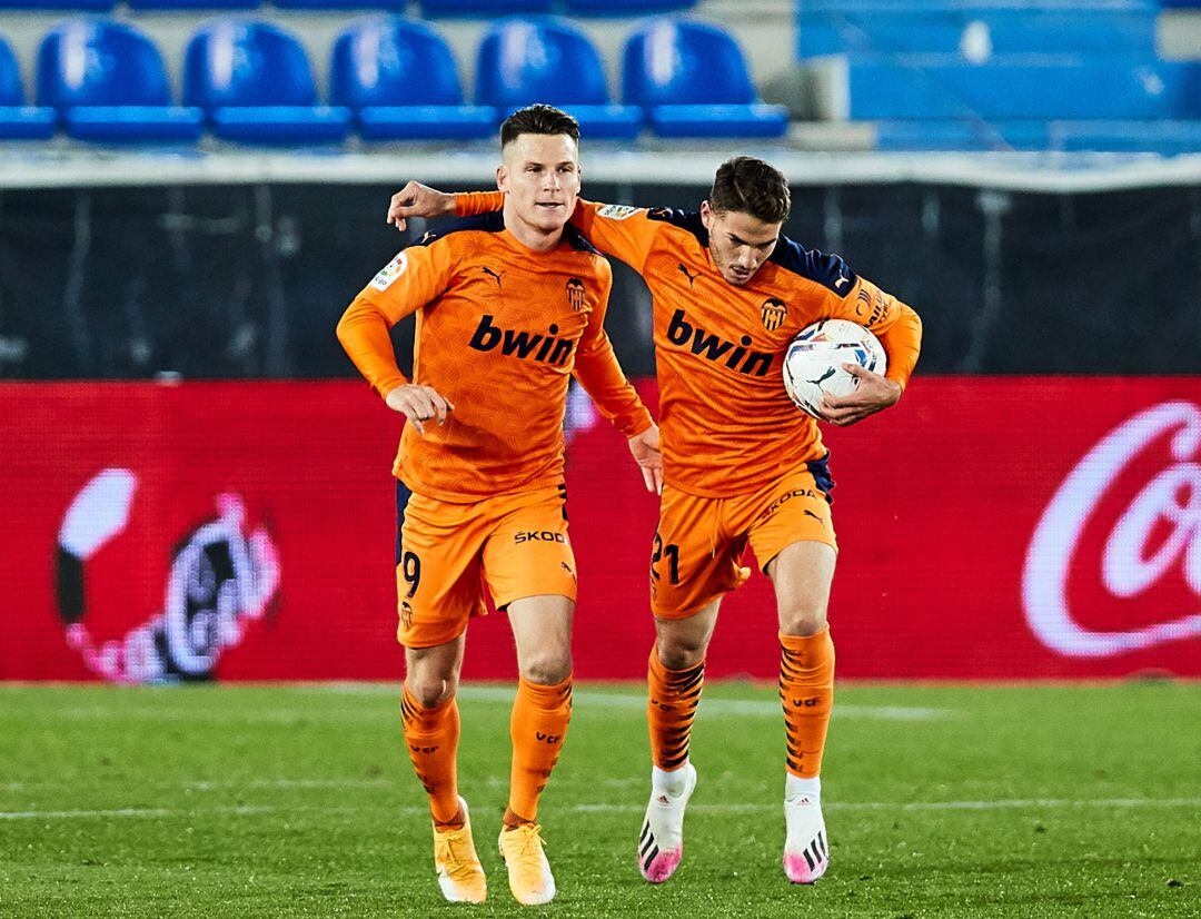 Kevin Gameiro and Manu Vallejo of Valencia CF celebrating a goal during the Spanish league, La Liga Santander, football match played between Deportivo Alaves and Valencia CF at Mendizorroza stadium.