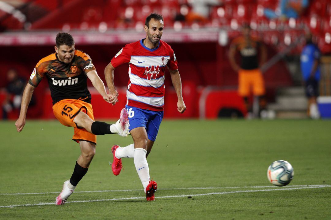 GRANADA, SPAIN - JULY 04: Manu Vallejo of Valencia CF scores his teams first goal during the Liga match between Granada CF and Valencia CF at Mestalla Stadium on July 04, 2020 in Granada, Spain. (Photo by Fran Santiago, Getty Images)