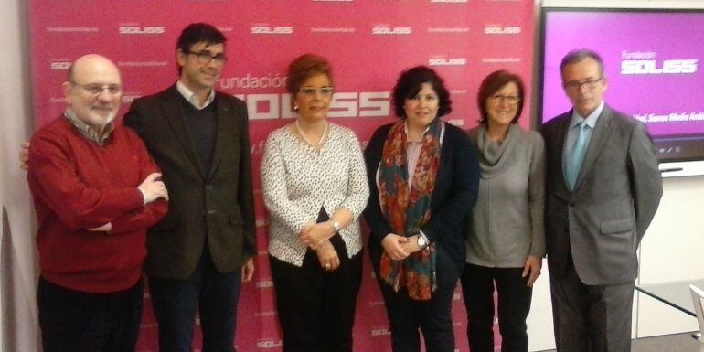 Representantes de "Soliss Seguros" de Cáritas y del Banco de Alimentos