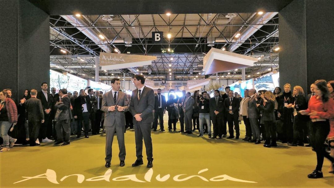 Juanma Moreno y Juan Marín, en la inauguración del espacio de Andalucía en Fitur