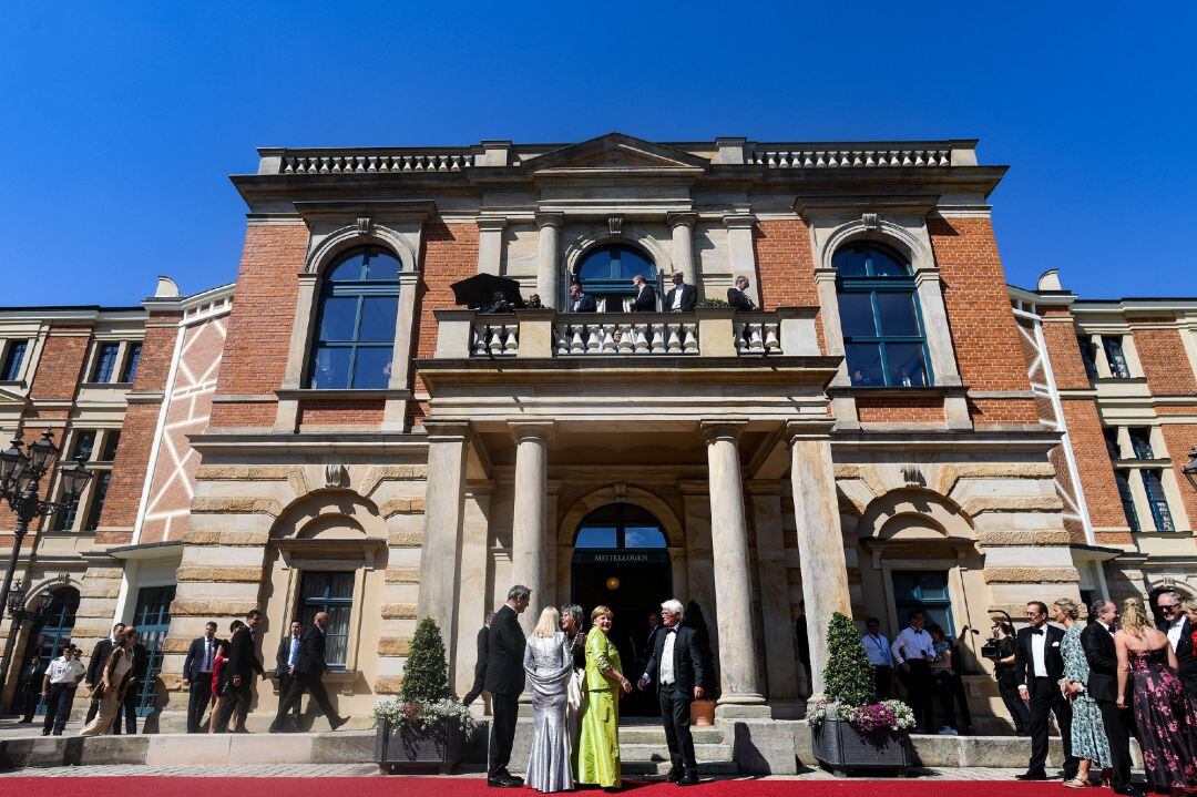 German Chancellor Angela Merkel (C), Bavarian State Prime Minister Markus Soeder (L) and his wife Karin (2-L) arrive for the opening of the 108th Bayreuth Festival at the Richard-Wagner-Festspielhaus in Bayreuth, Germany, 25 July 2019