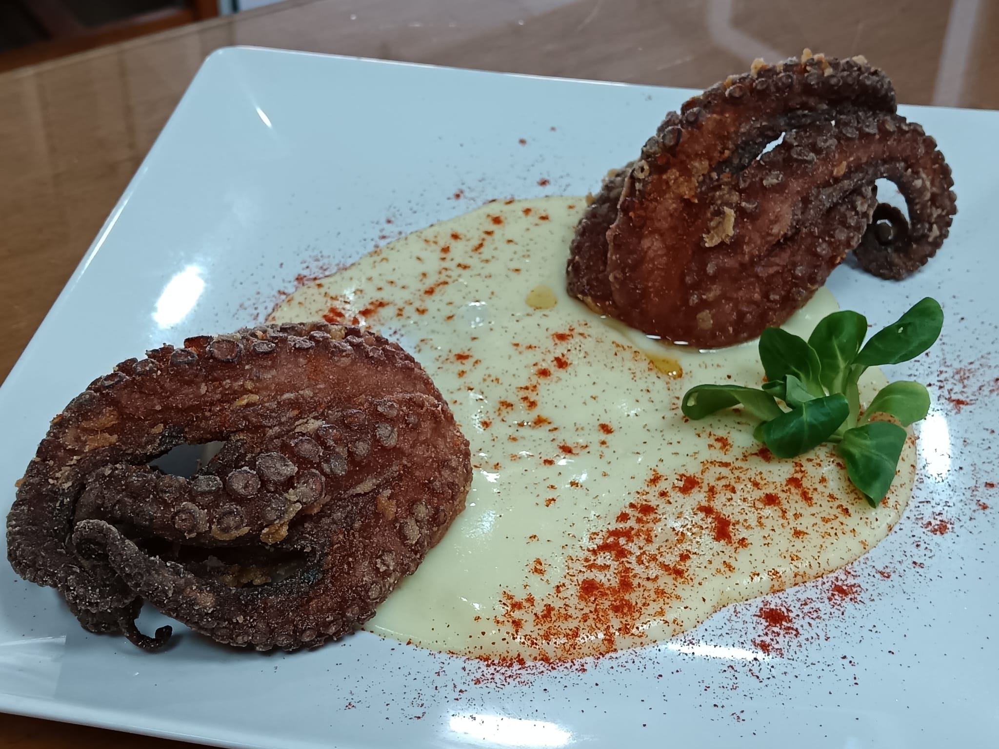 Pulpitos fritos con parmentier de patata