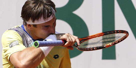 Ferrer, pensativo durante el partido con Bolelli