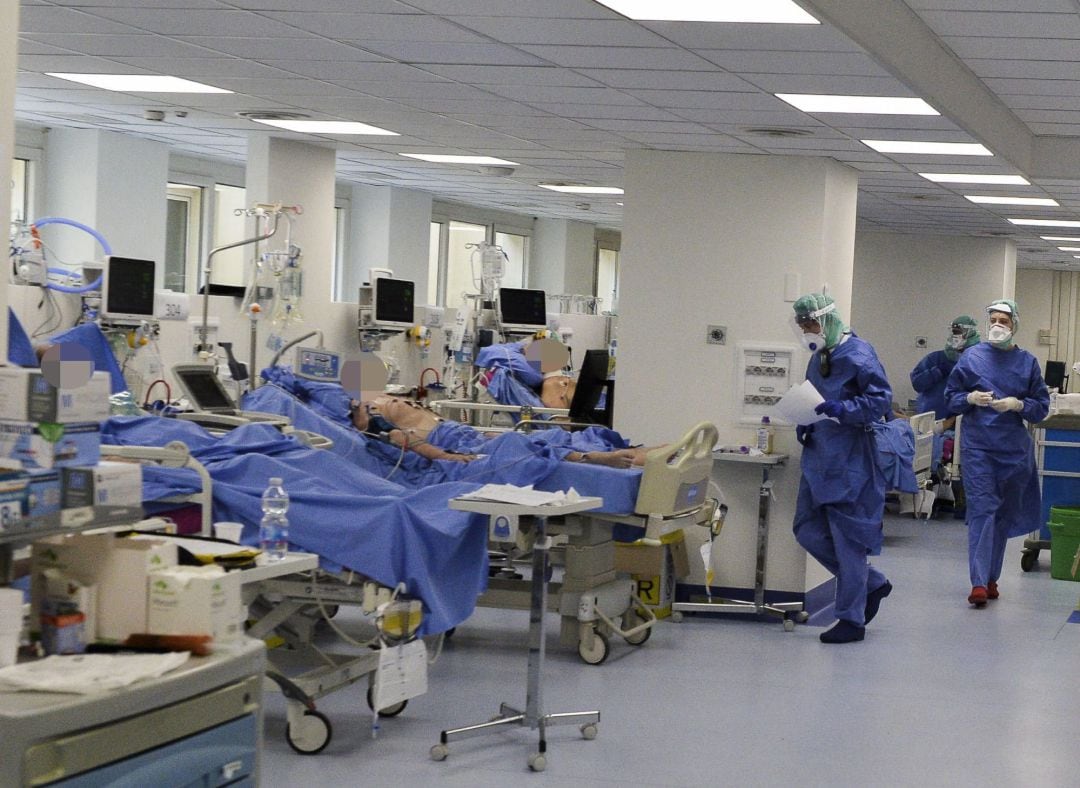 Medical personel and patients at a newly set up intensive care unit for the treatment of Coronavirus Covid-19 in the physiotherapy assistance gym of the Poliambilanza hospital in Brescia