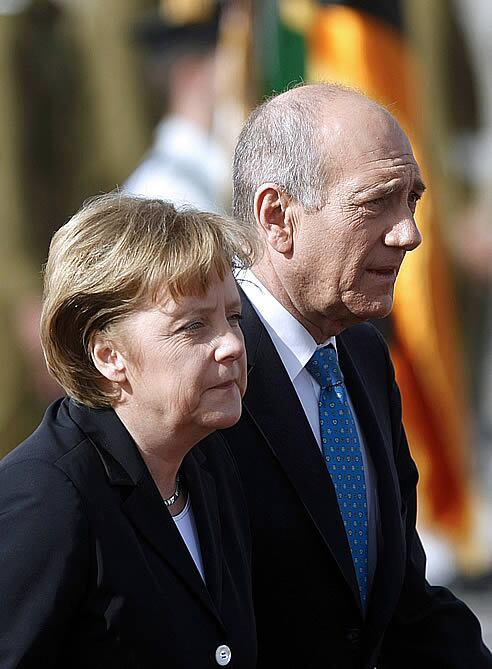 Ángela Merkel y Ehud Olmert