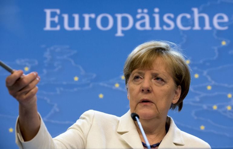 German Chancellor Angela Merkel speaks during a news conference at the end of a euro zone leaders summit in Brussels, Belgium, July 13, 2015. Euro zone leaders agreed on a roadmap to a possible third bailout for near-bankrupt Greece, but Athens must enact