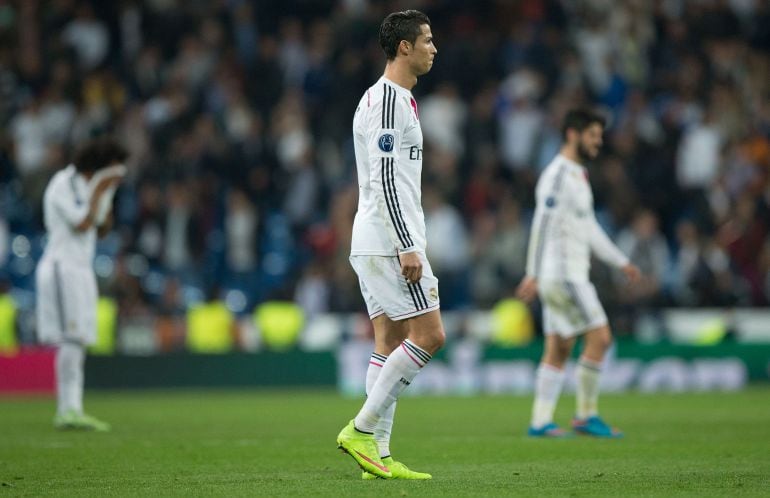 MADRID, SPAIN - MARCH 10: Cristiano Ronaldo of Real Madrid CF leaves the pitch after loosing the UEFA Champions League round of 16 second leg match between Real Madrid CF and FC Schalke 04 at Estadio Santiago Bernabeu on March 10, 2015 in Madrid, Spain.  
