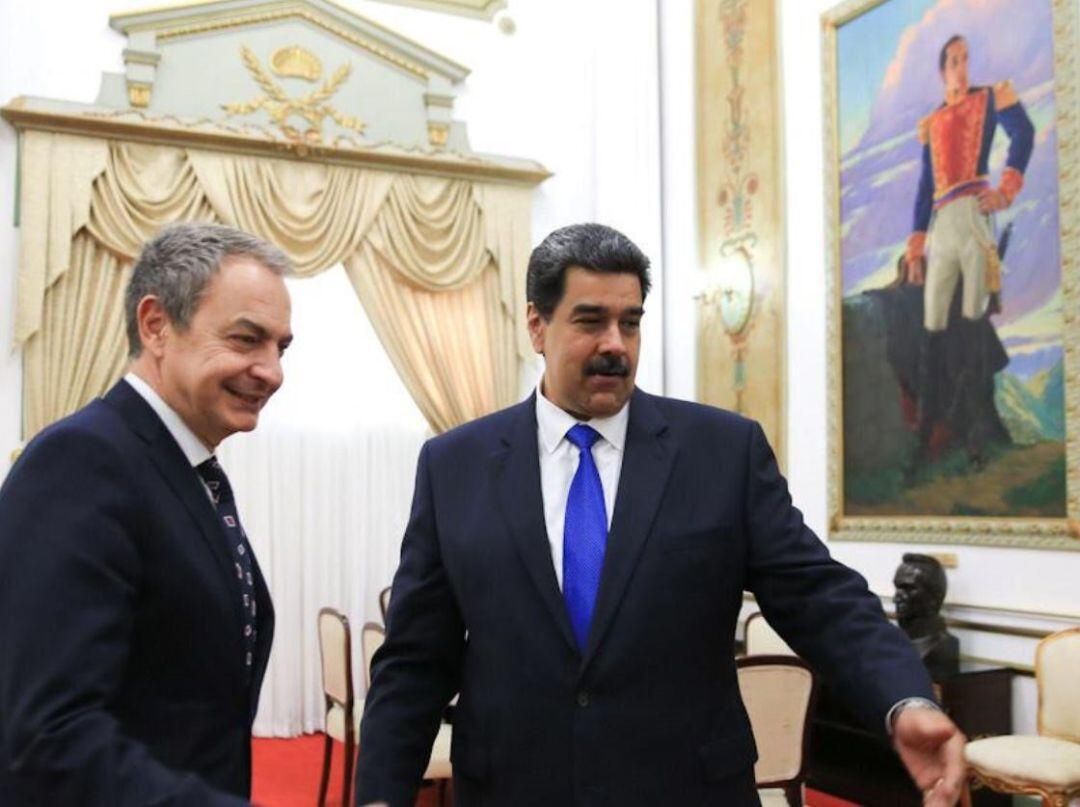 El presidente venezolano, Nicolás Maduro, y el expresidente del Gobierno español José Luis Rodríguez Zapatero