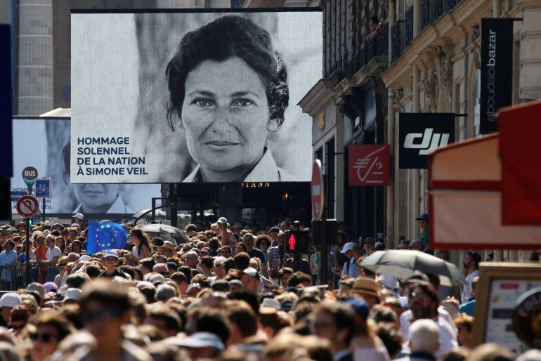 People gather near the Pantheon before a national tribute to late Auschwitz survivor and French health minister Simone Veil and her late husband Antoine Veil in Paris, France, July 1, 2018. 