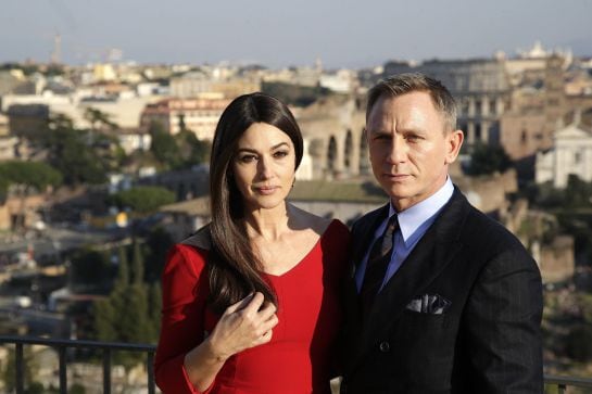 Actors Daniel Craig (R) and Monica Bellucci pose during a photo call for the new James Bond film &quot;Spectre&quot; in downtown Rome, February 18, 2015. REUTERS/Max Rossi (ITALY - Tags: ENTERTAINMENT)