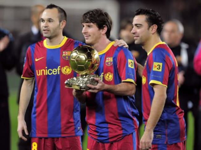 Iniesta, Messi y Xavi