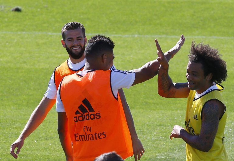 GRA348 MADRID, 11/09/2015.-Los jugadores del Real Madrid,Nacho Fernández (i),Carlos Henrique Casemiro (c), y Marcelo Vieira durante el entrenamiento hoy en Valdebebas, de cara al partido Liga que disputará frente al Espanyol el próximo sábado .- EFE/ J.P.