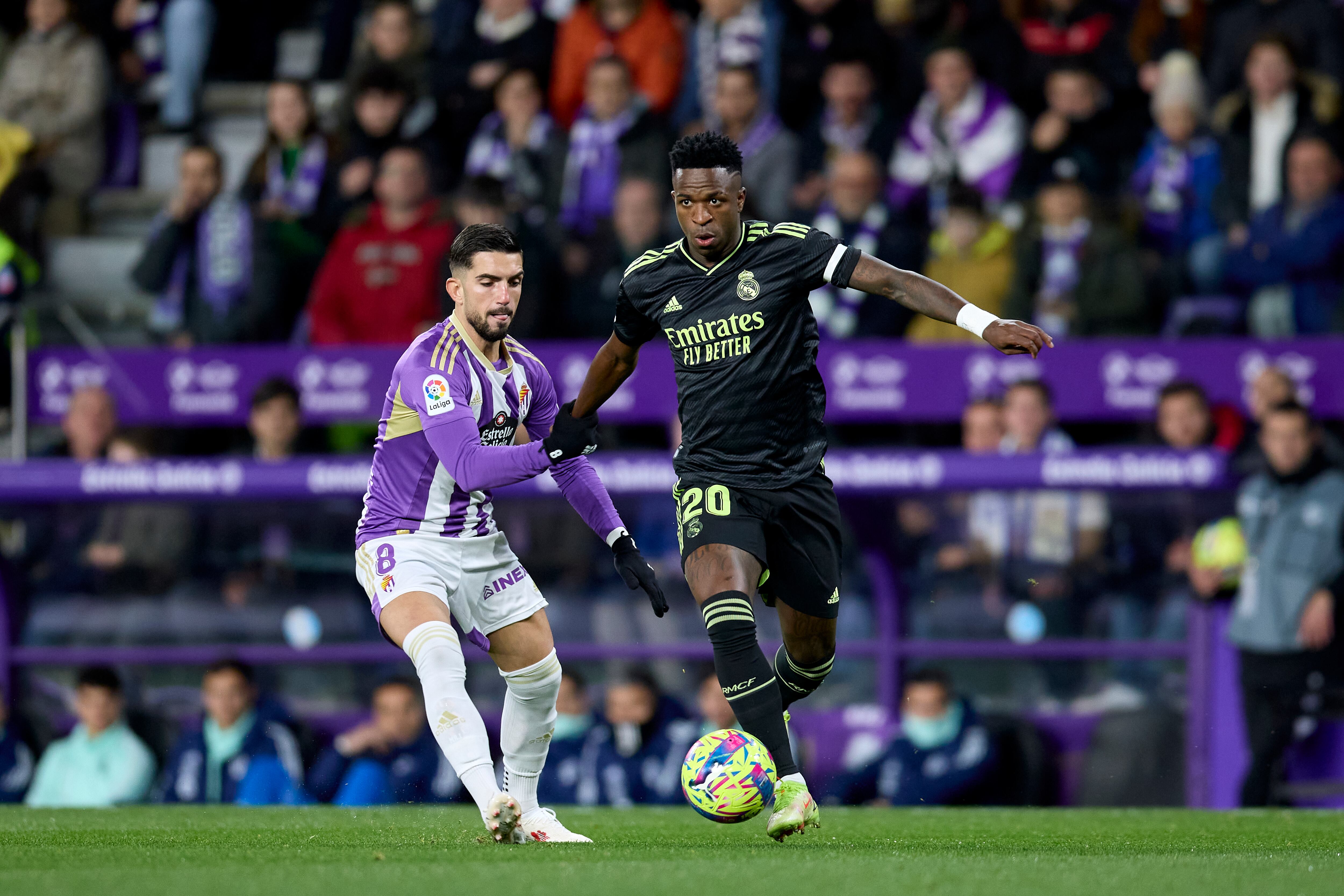 VALLADOLID, SPAIN - DECEMBER 30: Ramon Rodriguez &#039;Monchu&#039; of Real Valladolid CF compete for the ball with Vinicius Junior of Real Madrid CF during the LaLiga Santander match between Real Valladolid CF and Real Madrid CF at Estadio Municipal Jose Zorrilla on December 30, 2022 in Valladolid, Spain. (Photo by Ion Alcoba/Quality Sport Images/Getty Images)