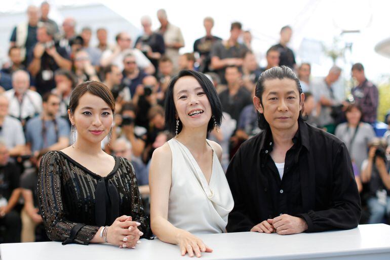 Photocall for the film &quot;Hikari&quot; (Radiance) in competition  Cannes, France. Director Naomi Kawase, cast members Masatoshi Nagase and Ayame Misaki pose.