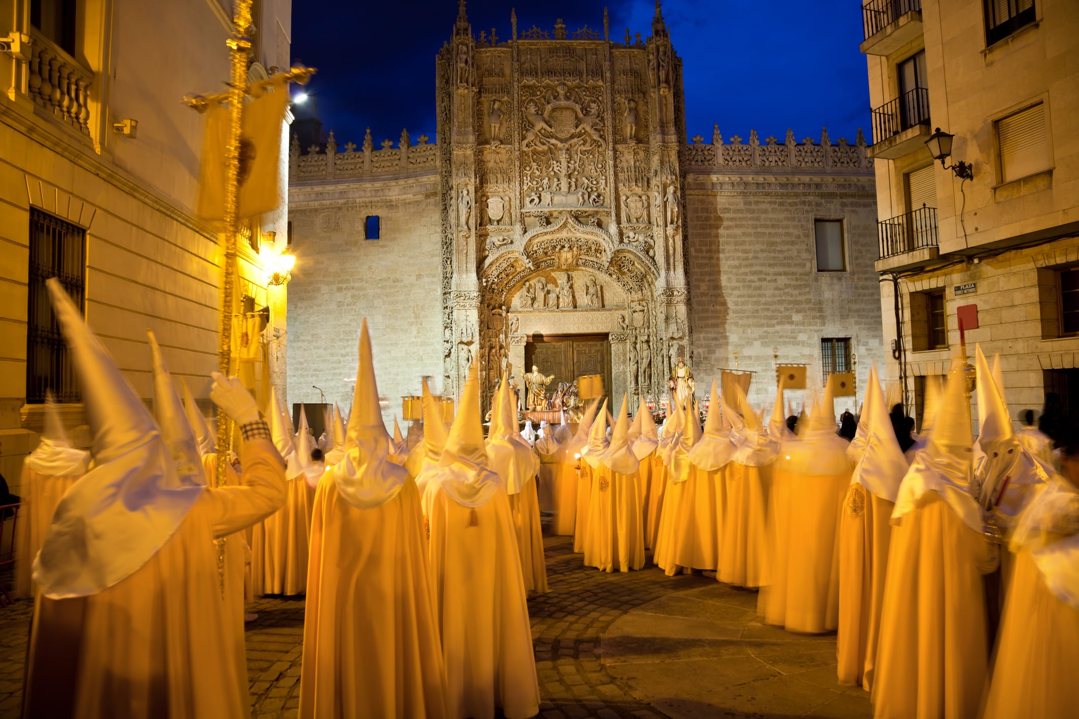 Traditional procession with two &quot;Pasos&quot; (wooden sculptures) rounded by Cofrades (Nazarenos) at the doors of the Colegio de San Gregorio, today National sculpture Museum. EOS 5D MarkII