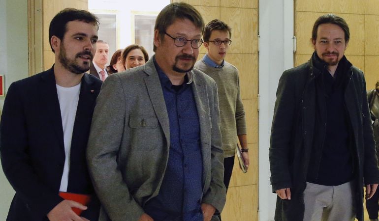 El líder de Podemos, Pablo Iglesias; el portavoz en el Congreso de la formación, Ínigo Errejón; el portavoz de En Comú Podem, Xavier Domènech, y el portavoz de IU, Alberto Garzón (d-i), en una foto de archivo.