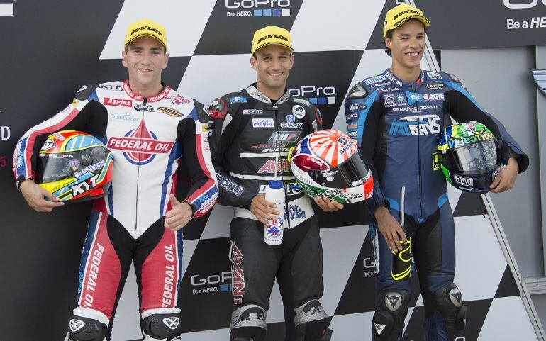 Xavier Simeon en el podio de Sachsenring junto a Johann Zarco y Franco Morbidelli.