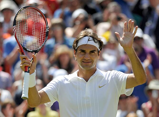 Federer celebra su victoria en Wimbledon