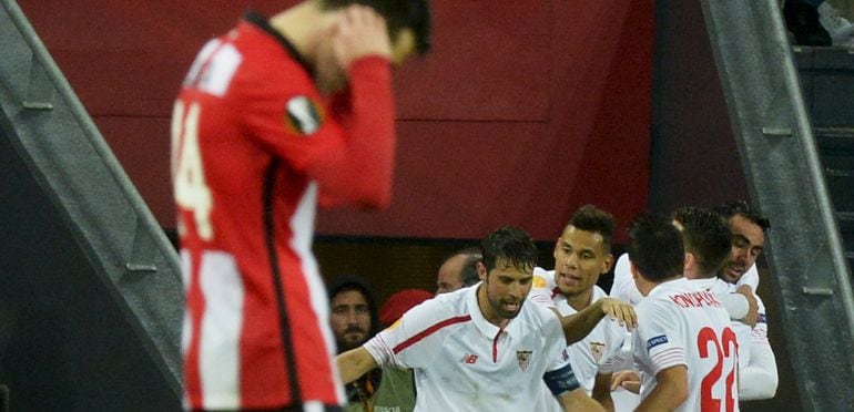 Sevilla players react after scoring during match against Athletic Bilbao