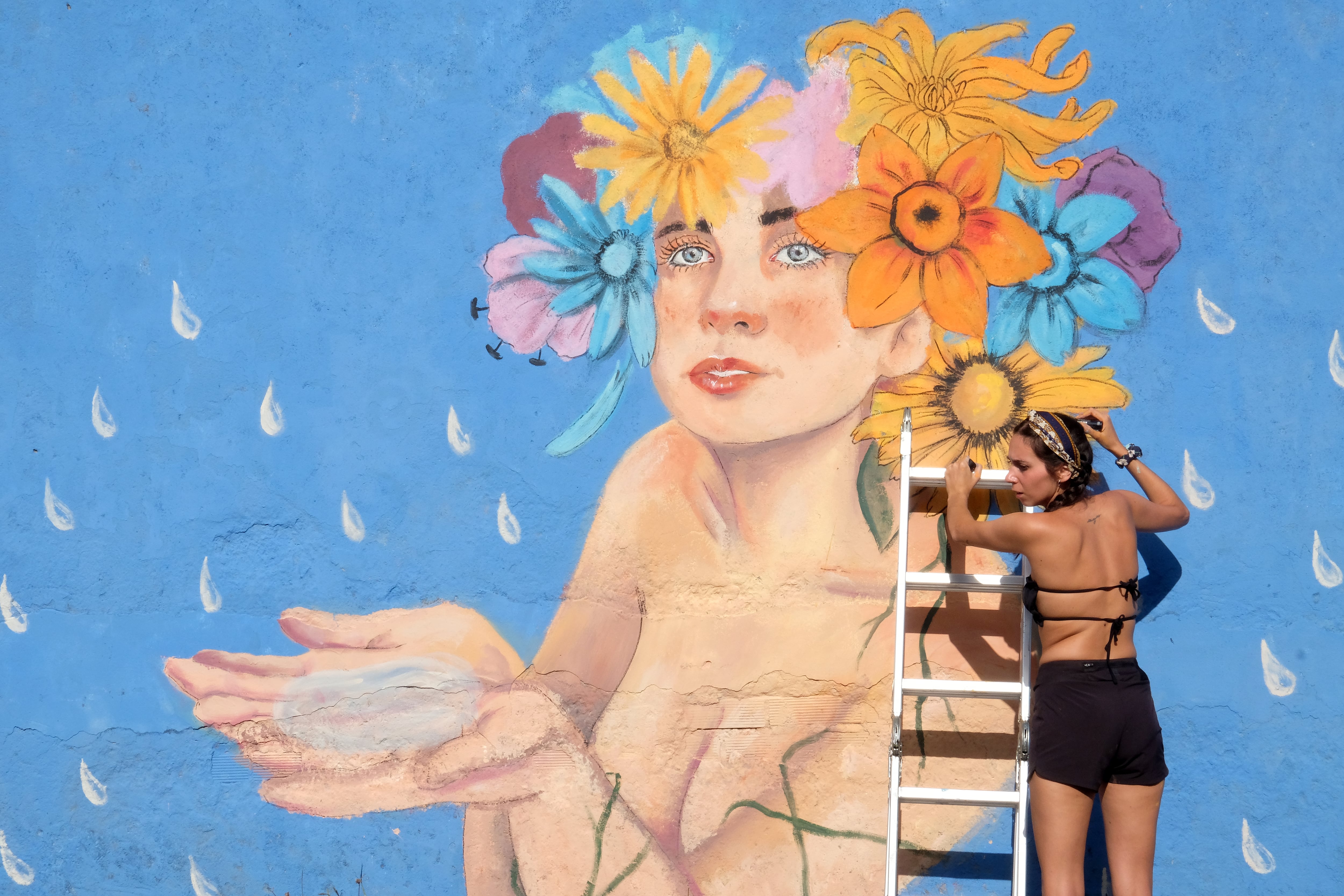 Ferrol celebra con toda normalidad tras las restricciones de ediciones pasadas su festival de arte urbano de las Meninas de Canido por el que lanza un mensaje de para rehalitación a través del arte urbano. foto:kiko delgado / EFE