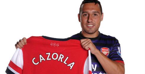 Cazorla posa con su nueva camiseta en la web del Arsenal www.arsenal.com