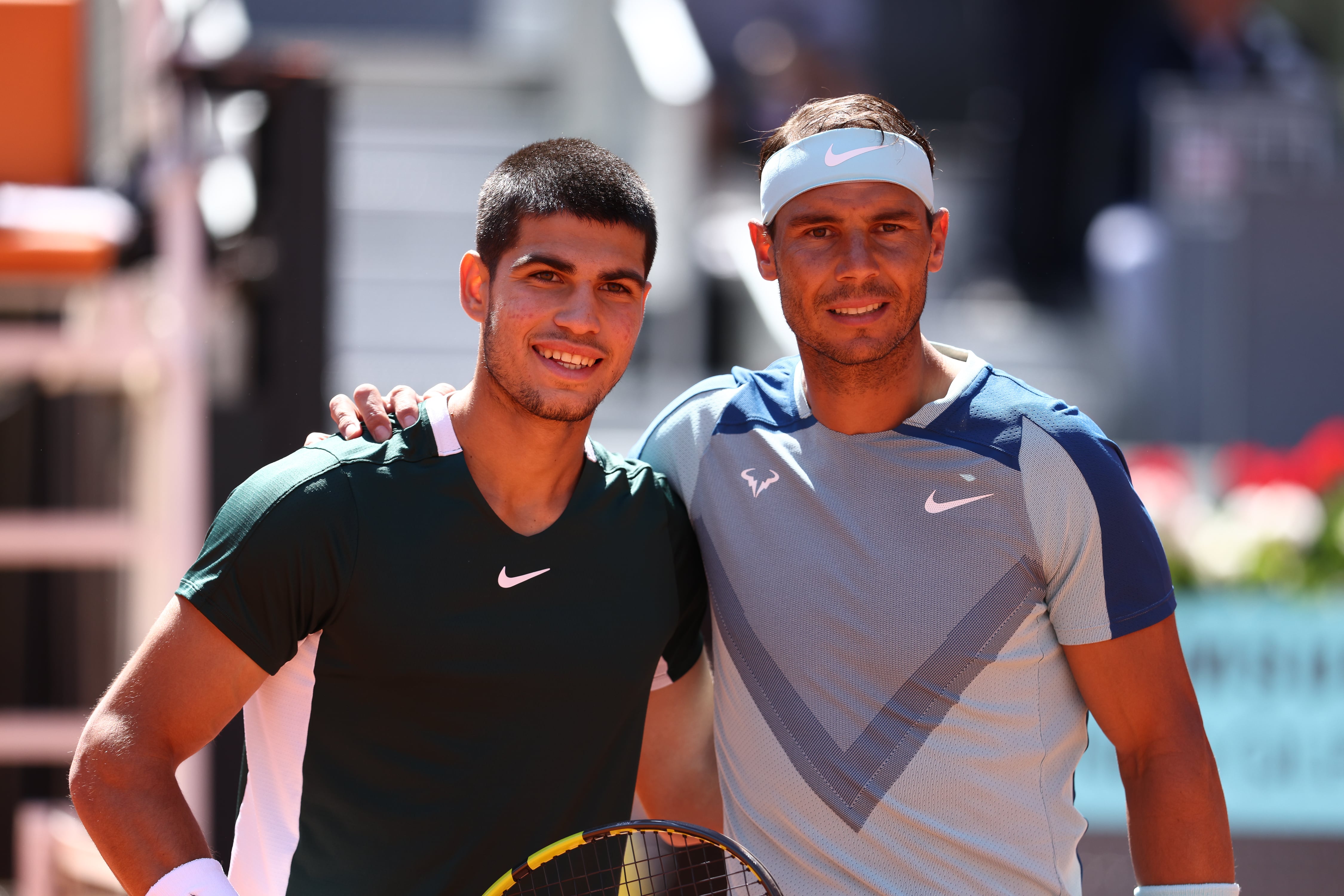 Rafa Nadal y Carlos Alcaraz, juntos en un partido del Mutua Madrid Open de 2022