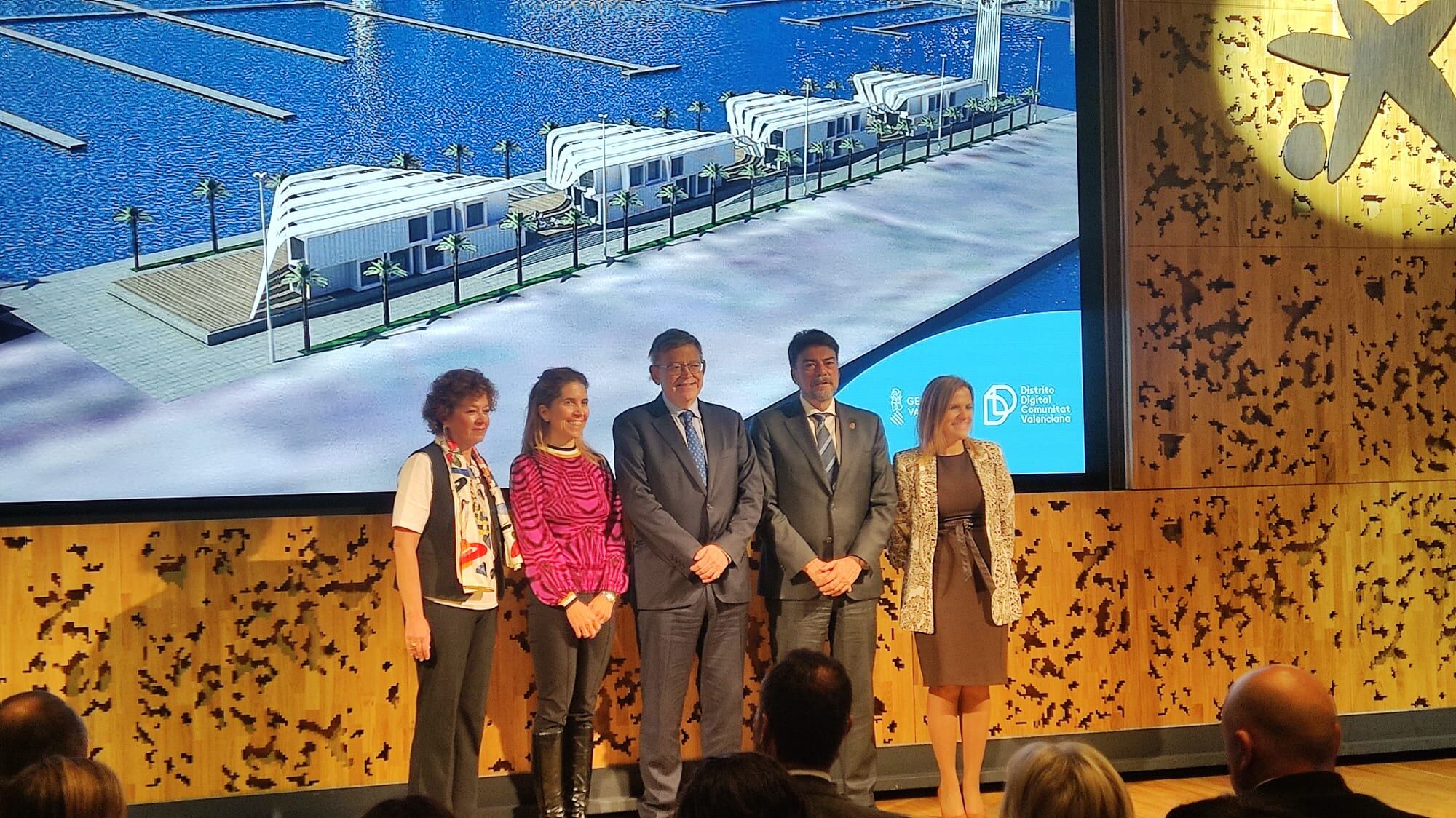 Los ponentes de la presentación de la candidatura, con Puig y Barcala en el centro, posan tras el acto en Madrid