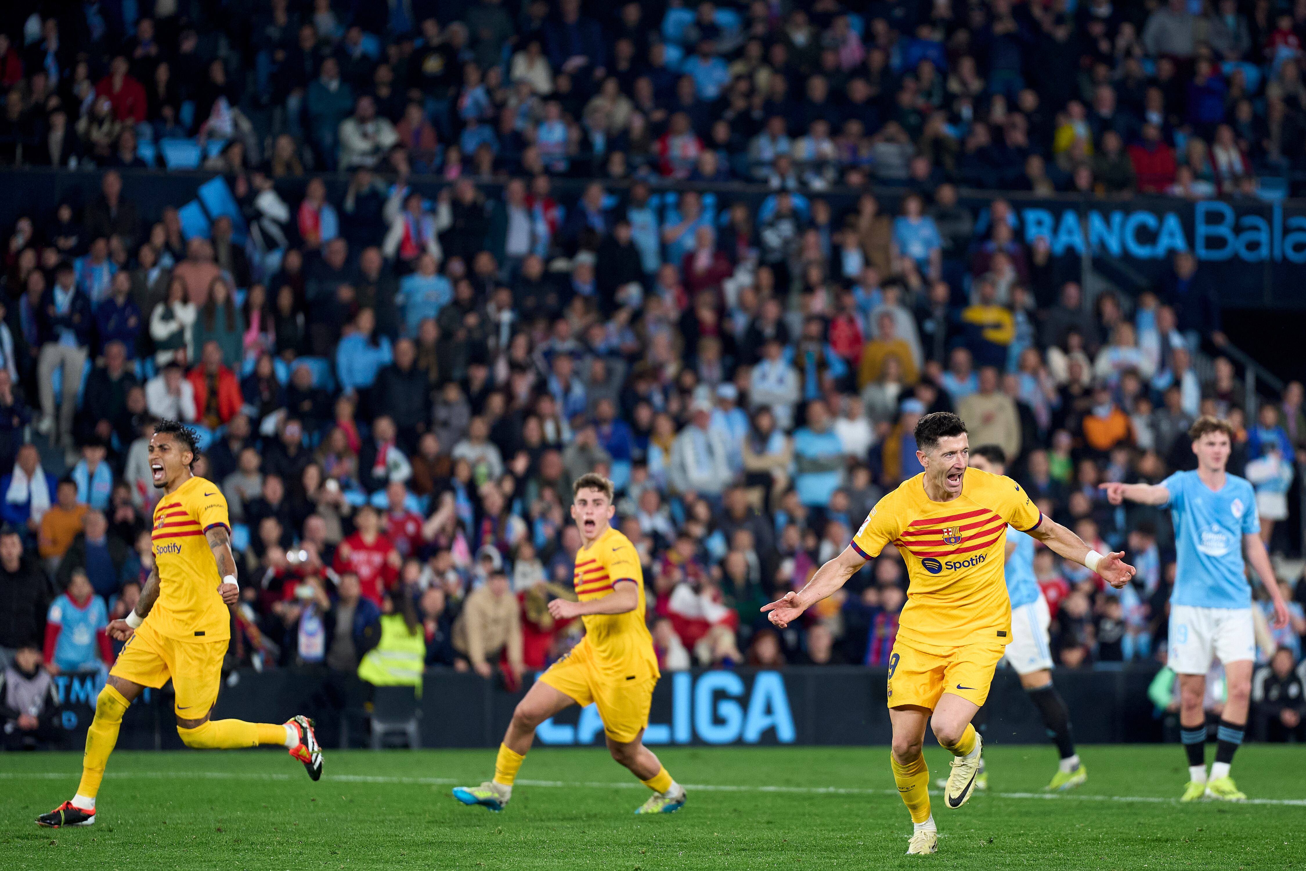 VIGO, SPAIN - FEBRUARY 17:  Robert Lewandowski of FC Barcelona celebrates after scoring his teams second goal during the LaLiga EA Sports match between RC Celta Vigo and FC Barcelona at Estadio Abanca Balaidos on February 17, 2024 in Vigo, Spain. (Photo by Jose Manuel Alvarez/Quality Sport Images/Getty Images)