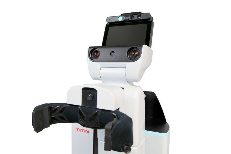 Toyota Motor Corporation presentó la última fase de desarrollo de su robot HSR para el cuidado de personas dependientes en la que colaborará con una decena de organizaciones japonesas para su implantación en el mercado.