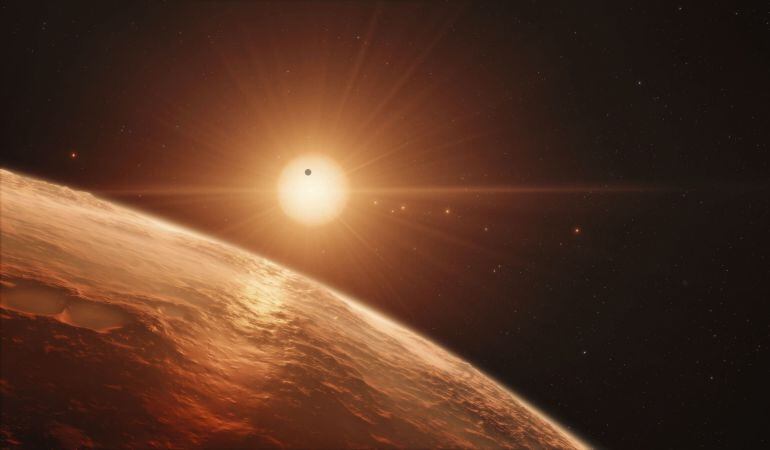 Fotografía sin fechar facilitada por el Observatorio Europeo Austral (ESO) hoy, 22 de febrero de 2017 que muestra una impresión artística de la vista desde la superficie de uno de los planetas del sistema