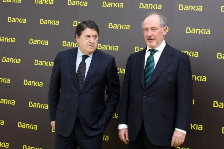 El exvicepresidente de Caja Madrid, José Luis Olivas, junto a Rodrigo Rato.