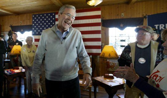 U.S. Republican presidential candidate Jeb Bush laughs as he arrives for a campaign event at the Greasewood Flats Ranch in Carroll, Iowa January 29, 2016. REUTERS/Rick Wilking