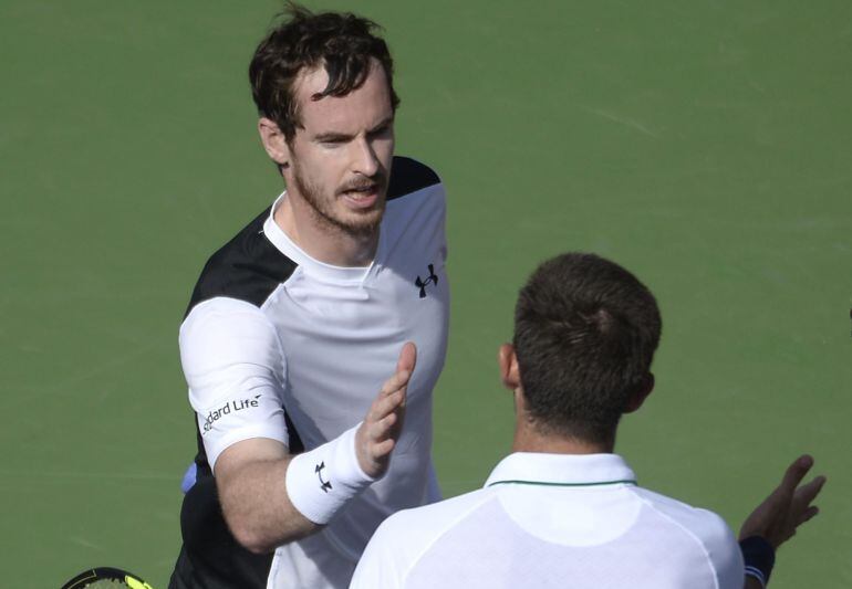 Murray y Delbonis en la red tras el partido.