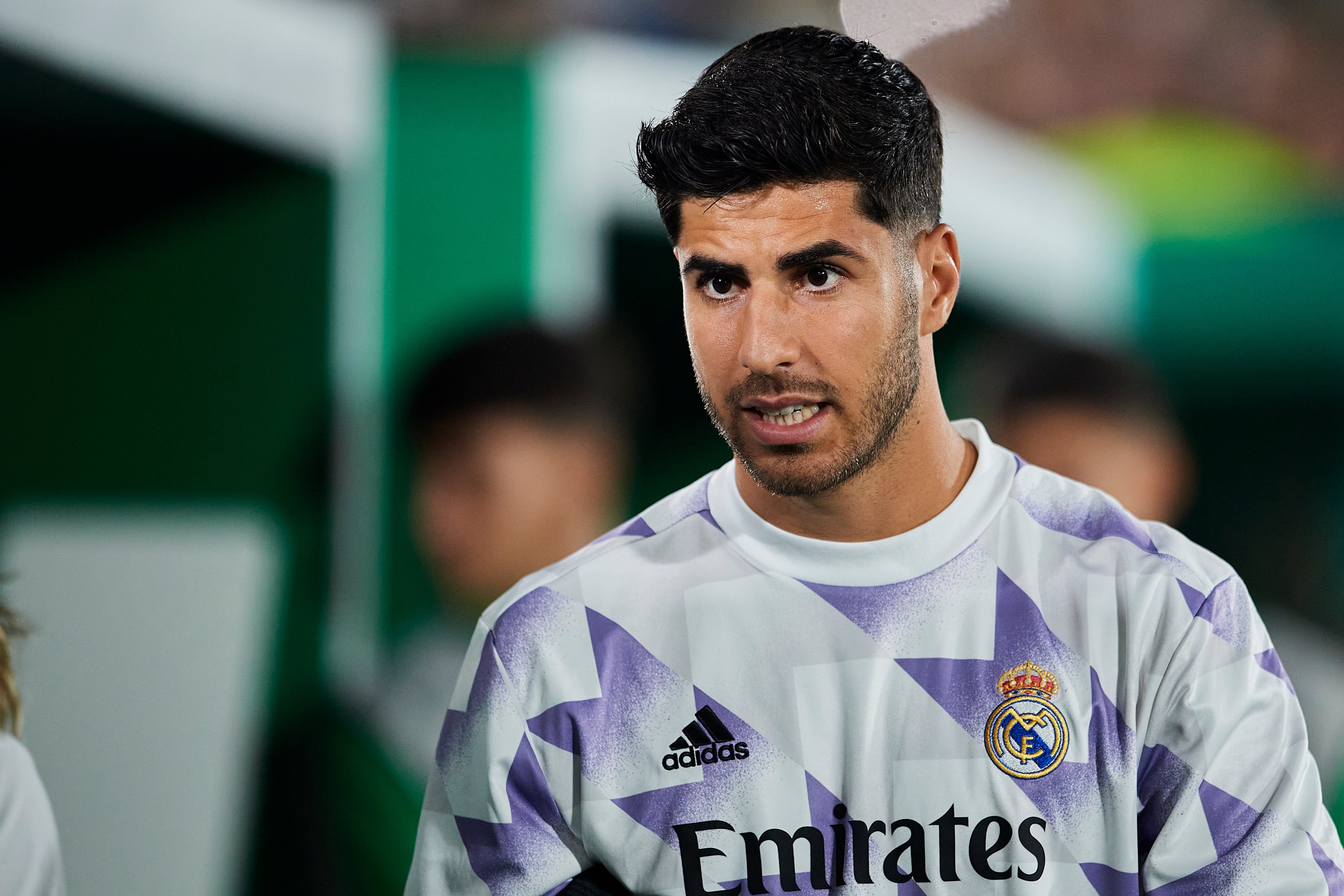 Marco Asensio, durante el calentamiento previo al partido contra el Elche