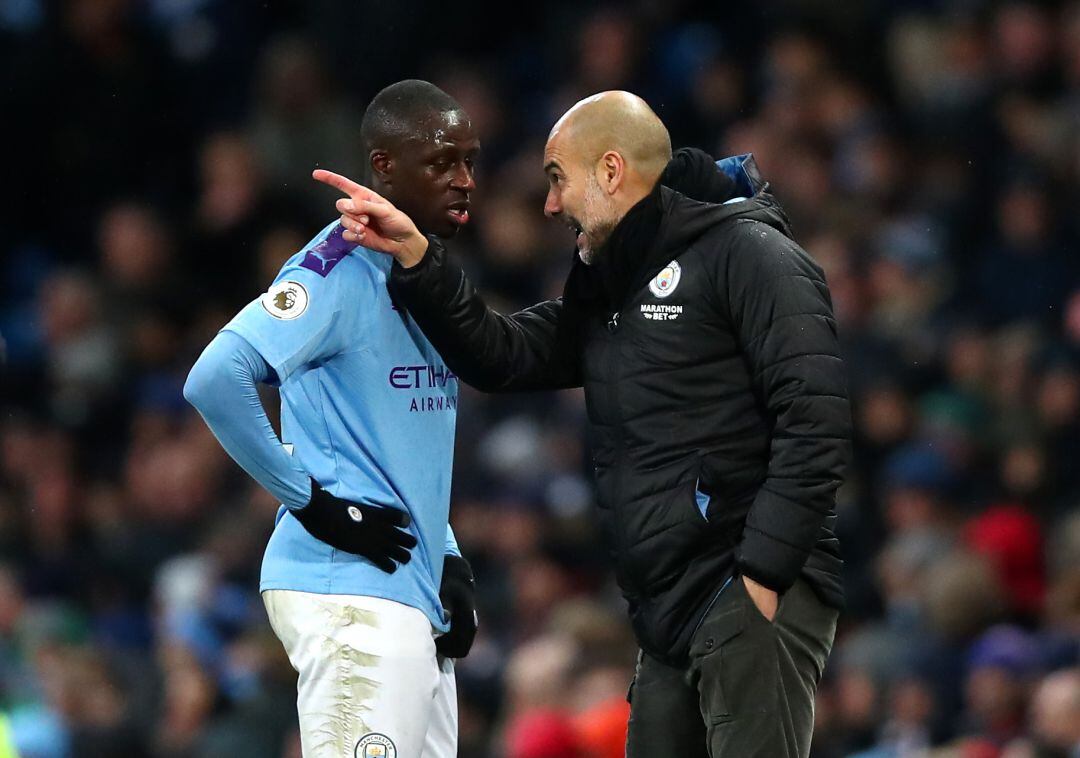 Mendy y Guardiola, en un partido del Manchester City en la Premier League.