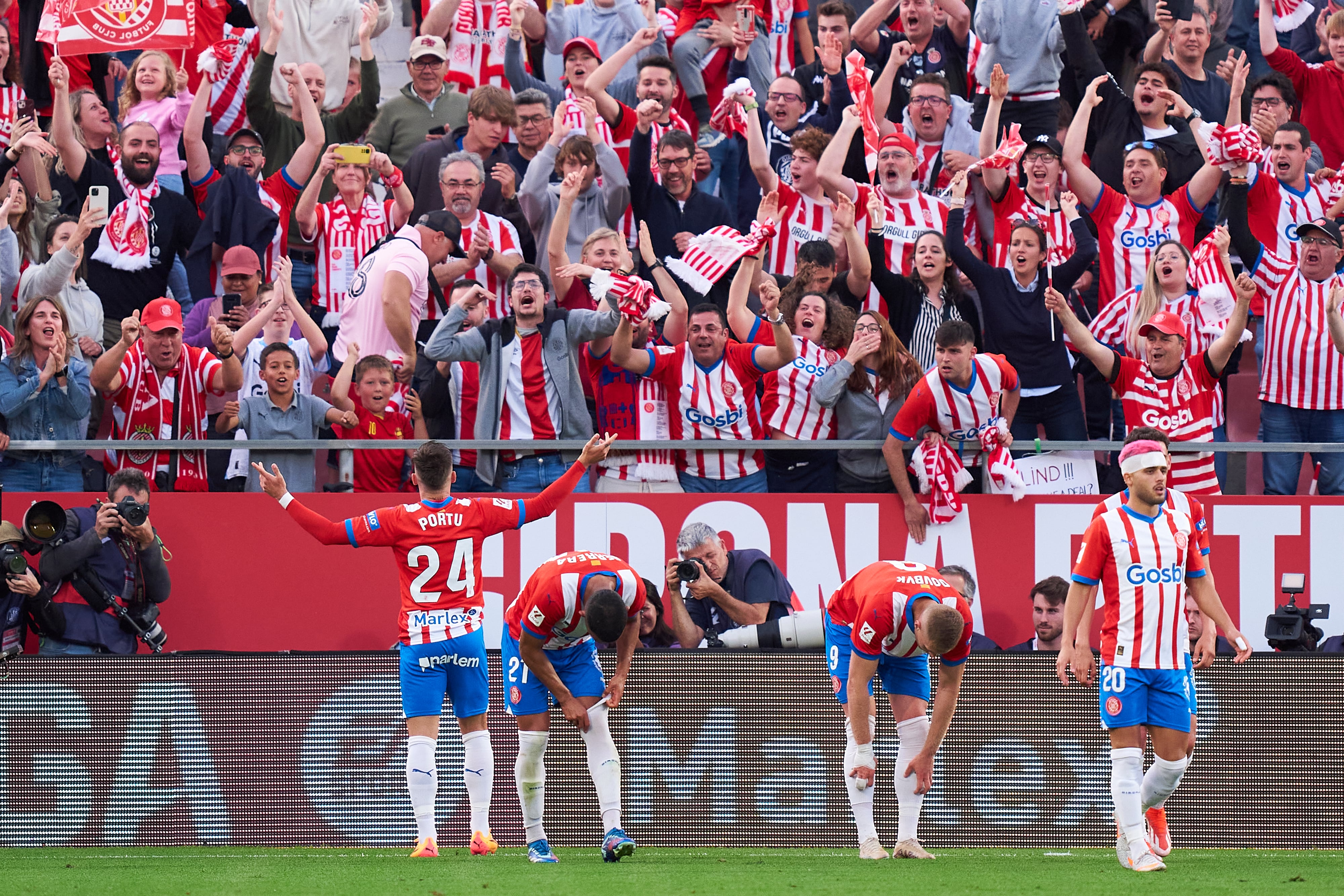 GIRONA, SPAIN - MAY 04: Players of Girona FC celebrating their team&#039;s second goal scored by Cristian Portugues &#039;Portu&#039; during the LaLiga EA Sports match between Girona FC and FC Barcelona at Montilivi Stadium on May 04, 2024 in Girona, Spain. (Photo by Pedro Salado/Getty Images)