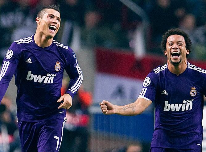 Cristiano y Marcelo celebran el primero gol del portugués