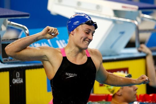 DOHA, QATAR - DECEMBER 03: Mireya Garcia Belmonte of Spain celebrates after winning and breaking the world record in the Women&#039;s 200m Butterfly Final on day one of the 12th FINA World Swimming Championships (25m) at the Hamad Aquatic Centre on December 3,